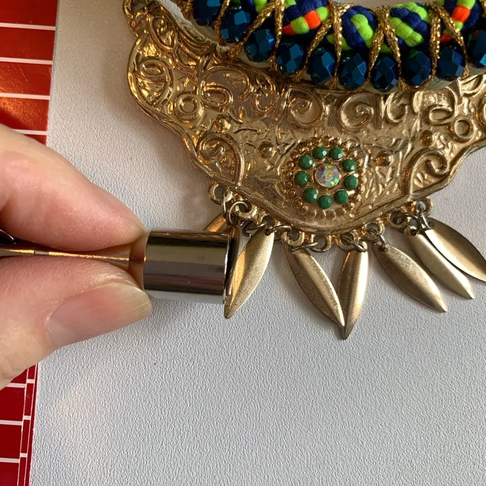 Unique hand made bib necklace in vibrant colors with mixed media.